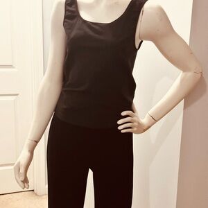 Women’s Black fitted Tank Top. Size small A great looking wardrobe basic!